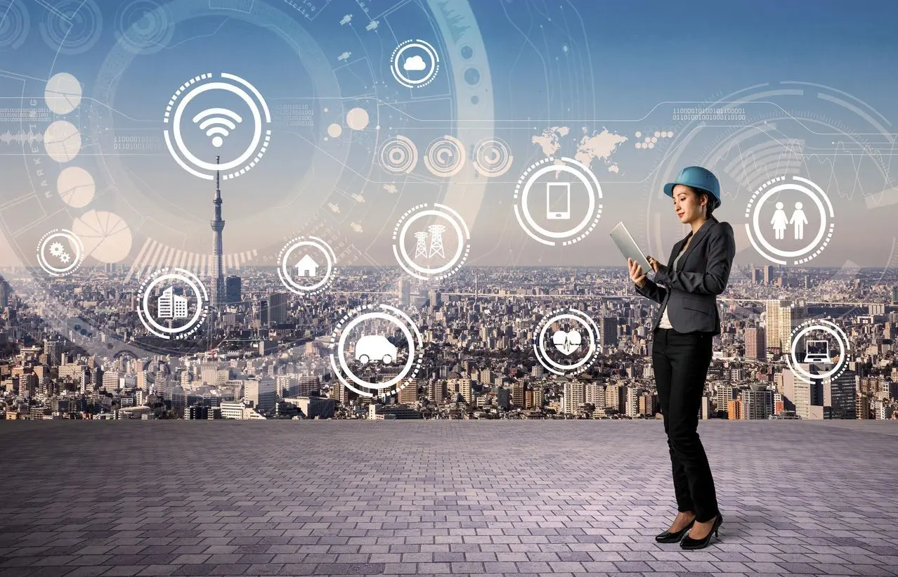 A woman standing on top of a building with an image of the city.